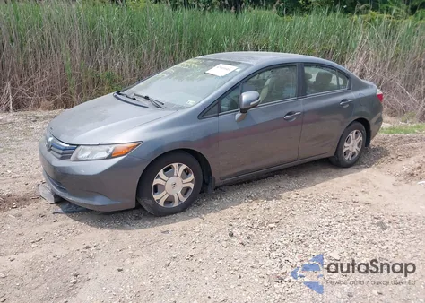 2012 Honda Civic Hybrid из США, поврежденный, VIN JHMFB4F20CS007090
